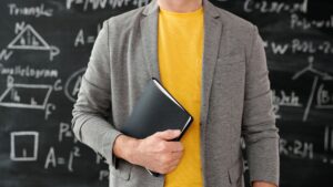 A teacher standing in a class in Canada