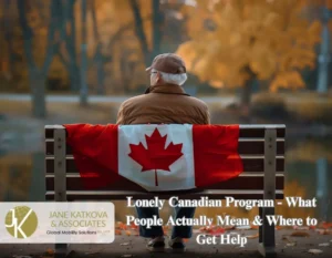 An elderly man sits alone on a park bench in autumn, viewed from behind, with a Canadian flag draped across the backrest.