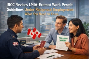 IRCC Revises LMIA-Exempt Work Permit Guidelines: A Canadian immigration officer assisting a couple, with the woman holding an approved work permit document in an office setting, with Canadian flags in the background.